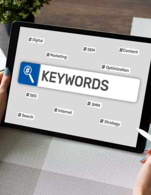 Best SEO For Press Release Writing in Ram Nagar, Coimbatore Keywords on tablet with hands holding it a collection of data keywords for SEO marketing.