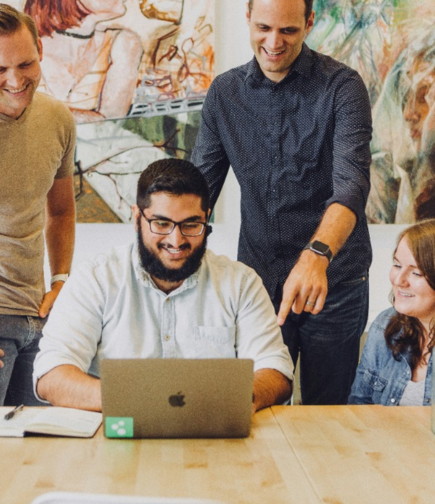 An energetic and enthusiastic team working on the video production and digital marketing services