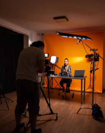 Best Production Video Business Promotion Company in Coimbatore A man takes great care when filming his video, ensuring every shot is taken precisely & artistically.